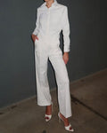 Damen Eleganter Jumpsuit mit tailliertem Schnitt und praktischen Taschen