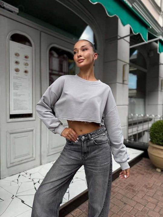 Damen Kurzgeschnittenes Sweatshirt mit ausfransendem Saum und überschnittener Schulter Shop Nory