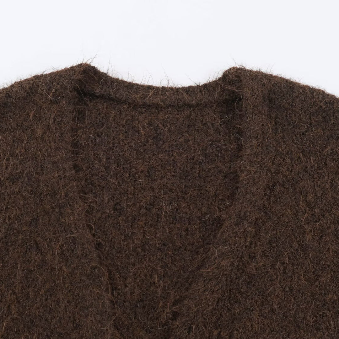 Damen Oversize Strickmantel mit V‑Ausschnitt, kuscheliger Bouclé‑Optik und aufgesetzten Taschen Shop Nory