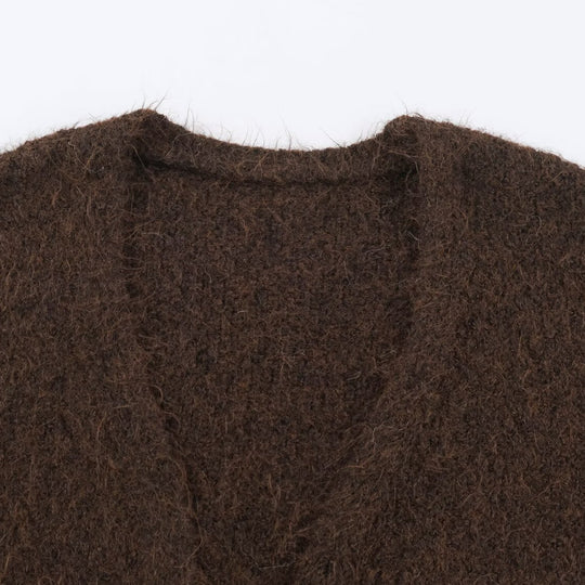 Damen Oversize Strickmantel mit V‑Ausschnitt, kuscheliger Bouclé‑Optik und aufgesetzten Taschen Shop Nory