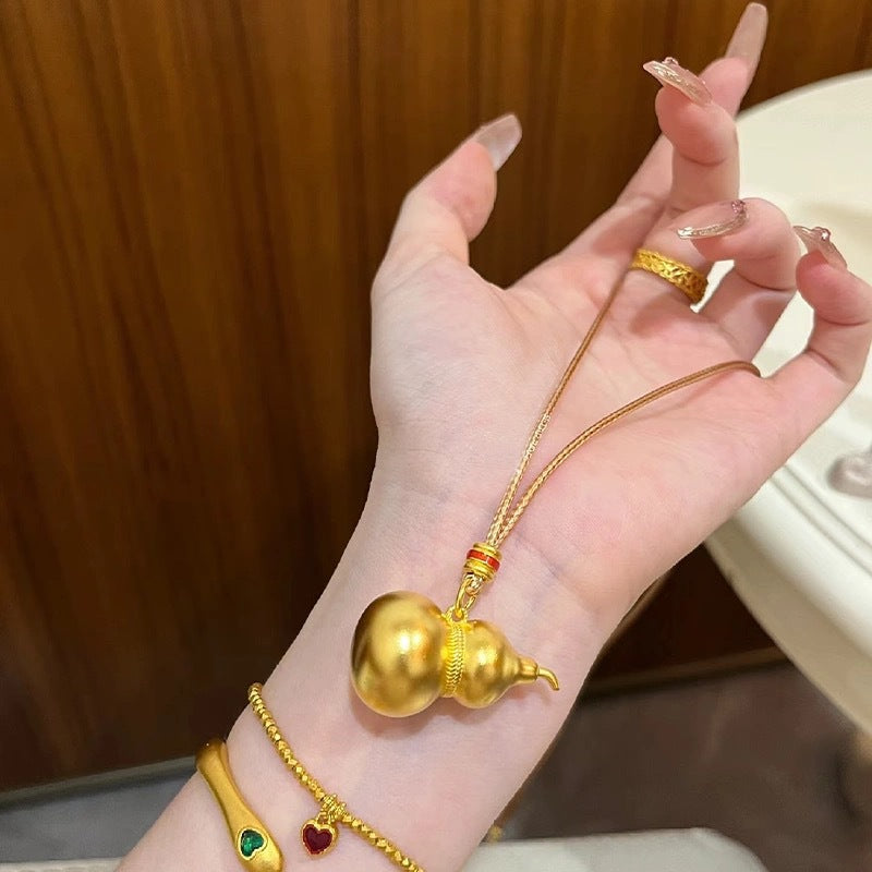 Damen Halskette mit kunstvollem Kürbisanhänger aus hochwertigem Edelstahl Shop Nory