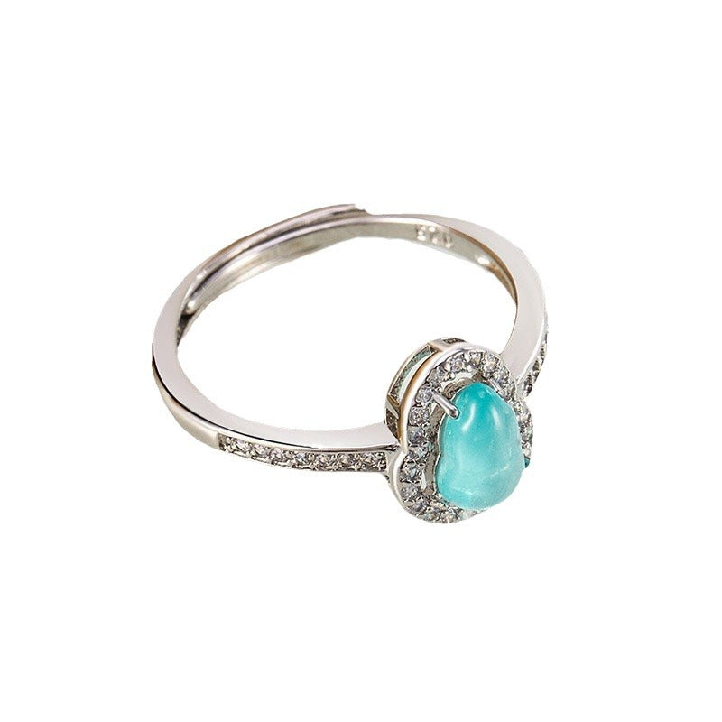 Damen eleganter Ring mit ovalem Zirkonia und funkelndem Rahmen Shop Nory