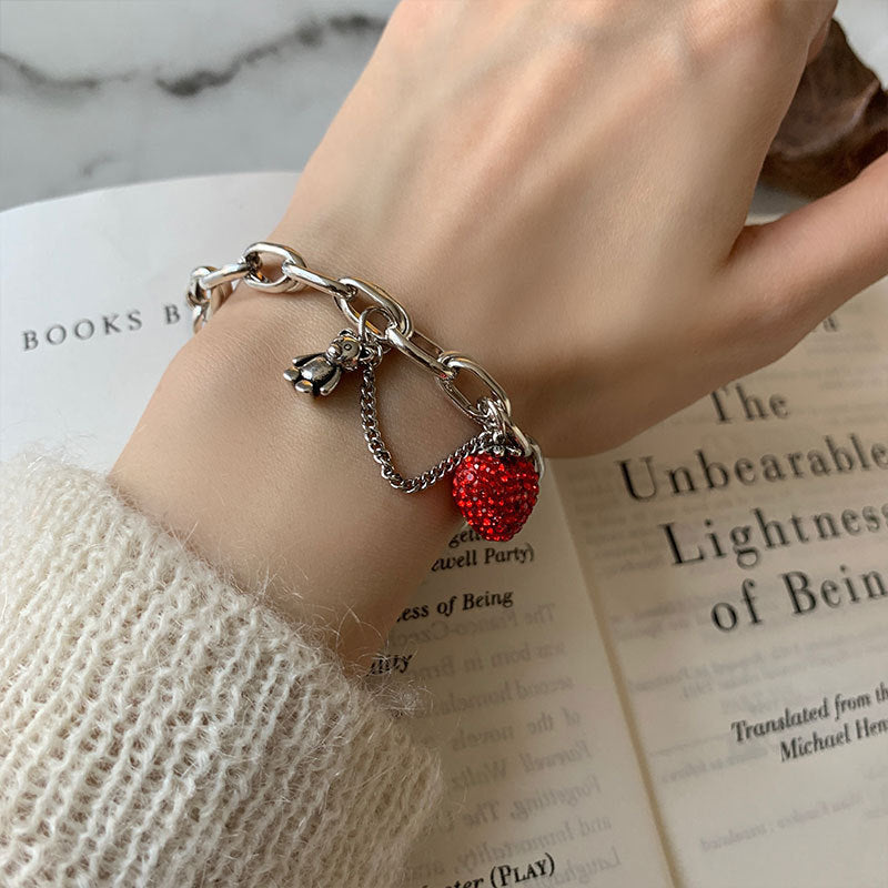 Damenarmband mit herzförmigem Anhänger und funkelnden Details Shop Nory