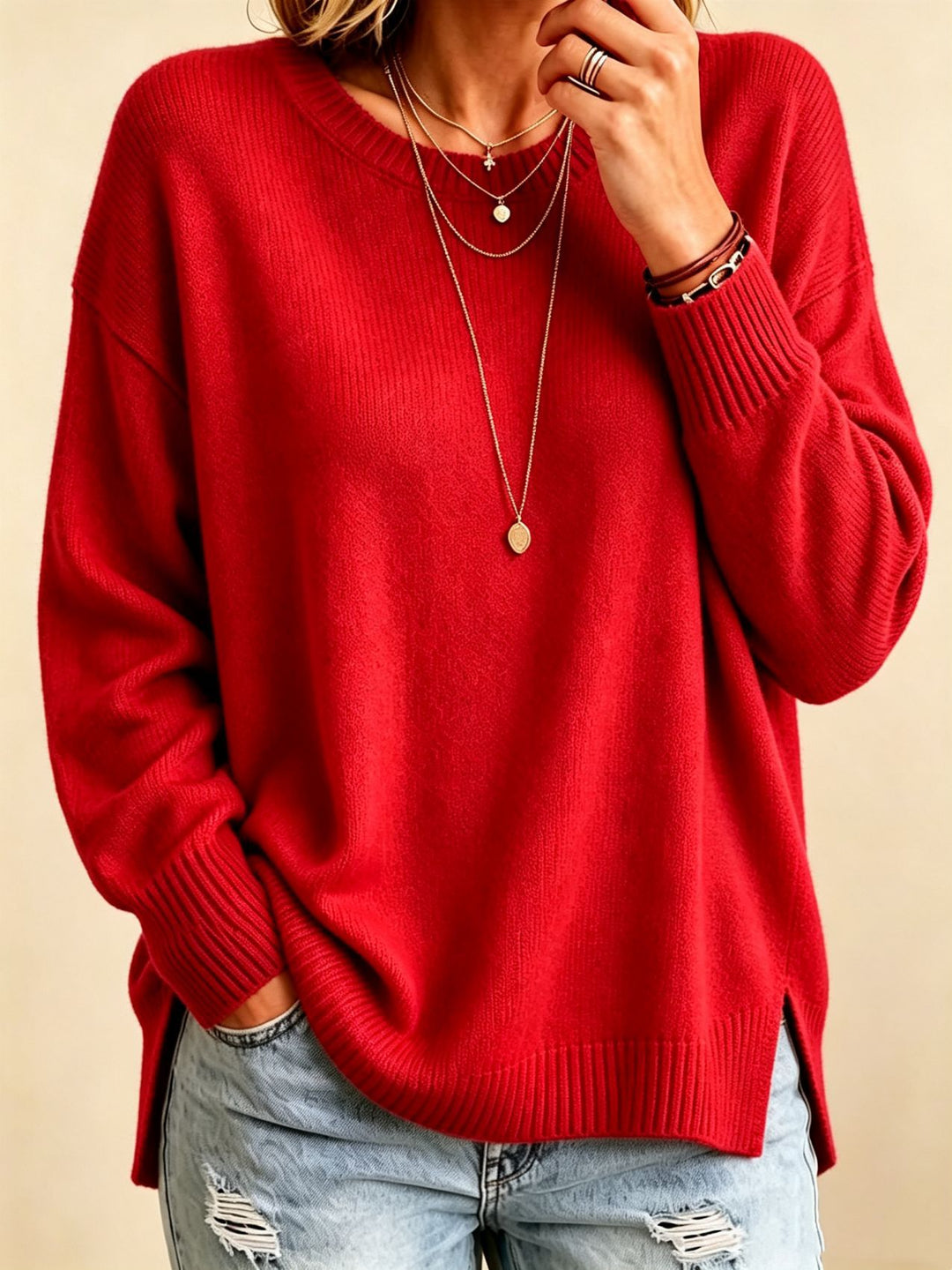 Damen Locker geschnittener Rundhals-Feinstrickpullover mit Seitenschlitzen und gerippten Bündchen Shop Nory