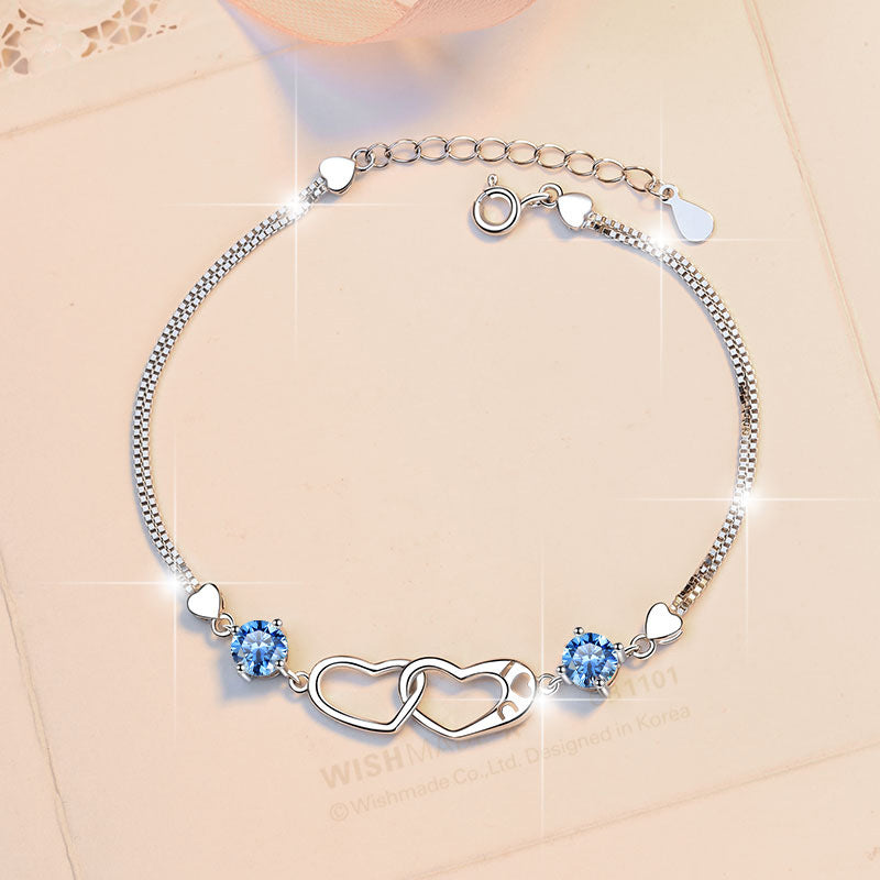 Damenarmband mit elegantem Herzdesign und funkelnden Zirkonia Shop Nory
