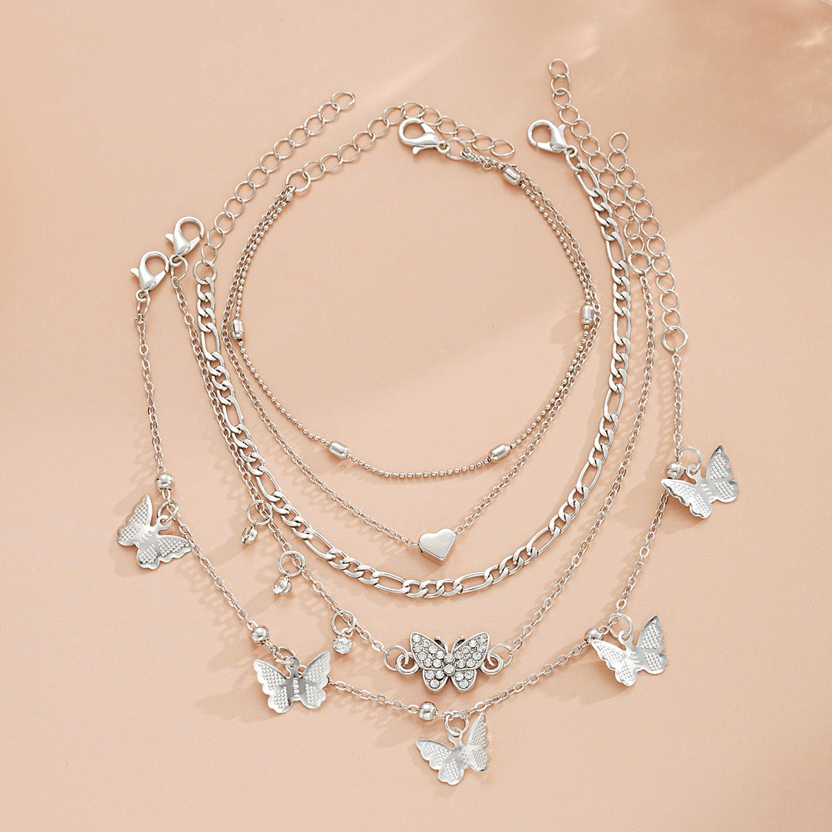 Damen Fußkettchen mit filigranen Schmetterlings- und Herzanhängern Shop Nory