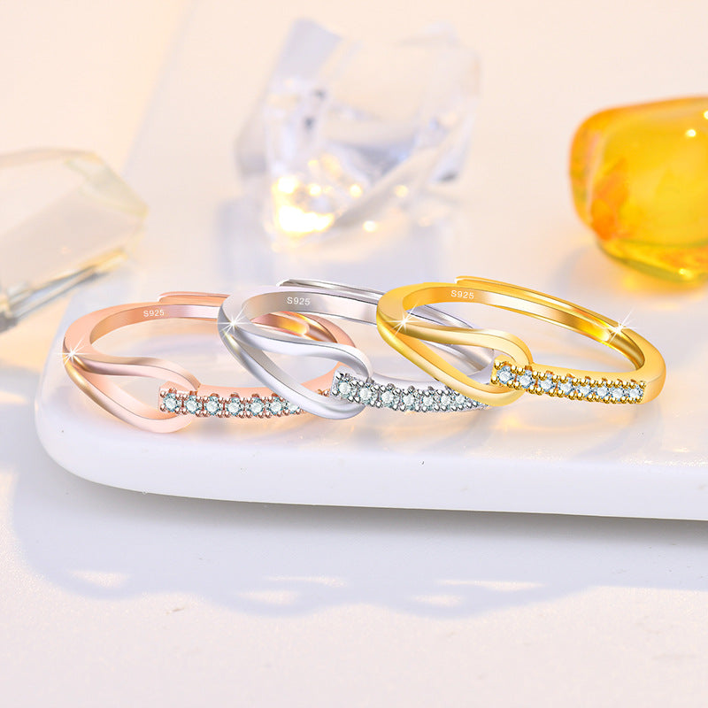 Damenring mit elegantem Wellen-Design und funkelnden Zirkonia Shop Nory