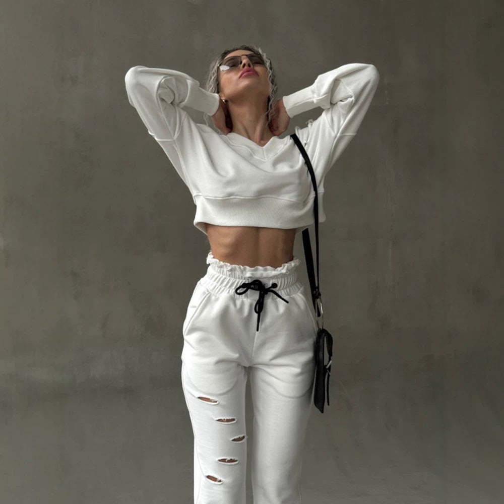 Damen kurzgeschnittenes Sweat-Set mit V-Ausschnitt, Rüschenbund Highwaist Jogginghose und Distressed-Details Shop Nory