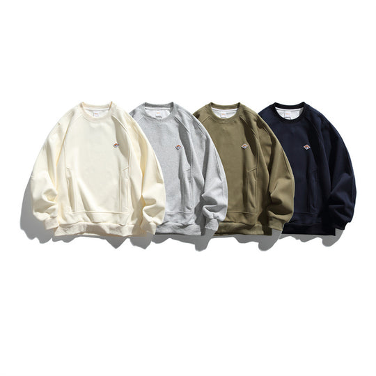 Unisex Oversize-Sweatshirt aus French-Terry mit Raglanärmeln, verdeckten Eingrifftaschen und kleinem Logopatch Shop Nory