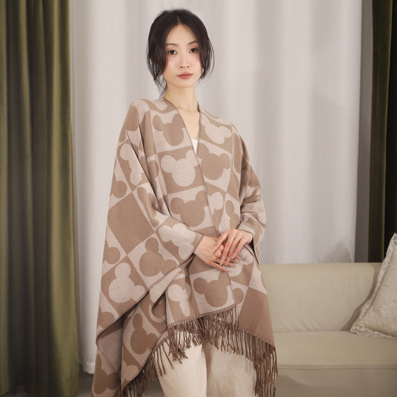 Damen Oversize-Jacquardponcho mit grafischem Kopf-Silhouettenmuster und Fransen Shop Nory