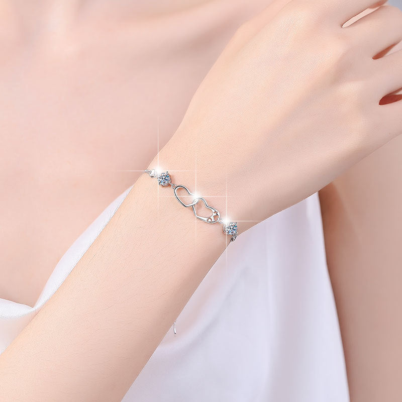 Damenarmband mit Herzdesign und funkelnden Kristallen Shop Nory