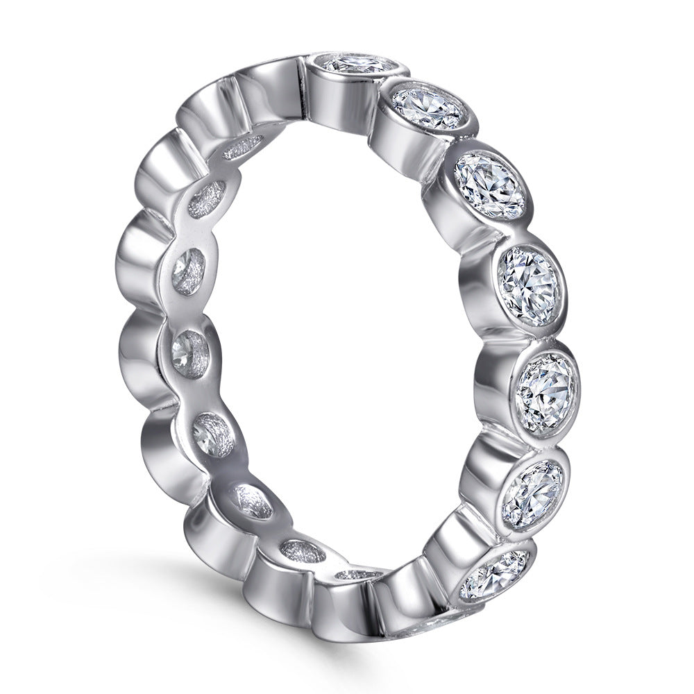 Damen Eternityring mit funkelnden Zirkonia-Steinen und geschwungenem Design Shop Nory