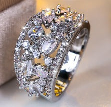 Damen Ring mit kunstvollem Rosé-Golddesign und funkelnden Zirkonia-Steinen Shop Nory