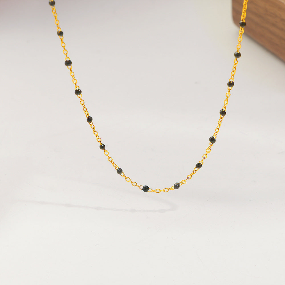 Damen feine Halskette mit bunten Edelstein-Details und goldener Gliederkette Shop Nory