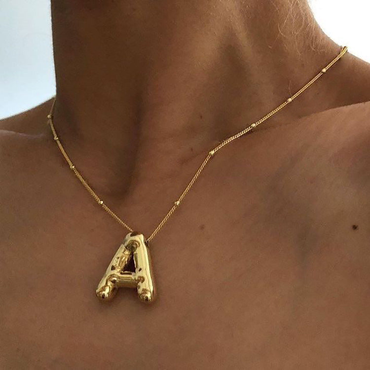 Damen Halskette mit stilvollem Buchstabenanhänger Shop Nory