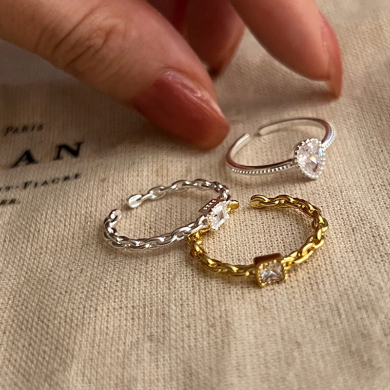 Damenring mit filigranem Kettendesign und funkelndem Kristall Shop Nory