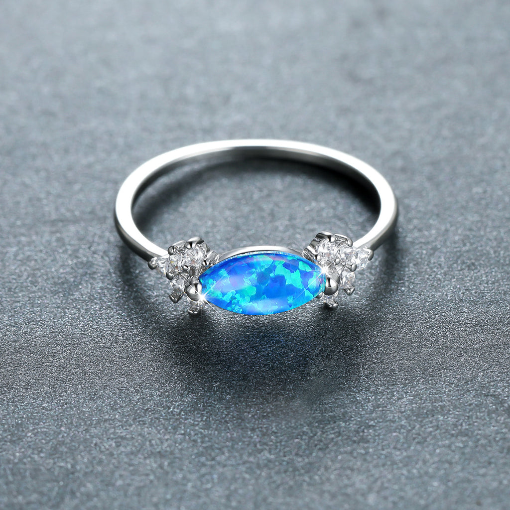 Damen Ring mit schillerndem Opal und funkelnden Zirkonia Shop Nory