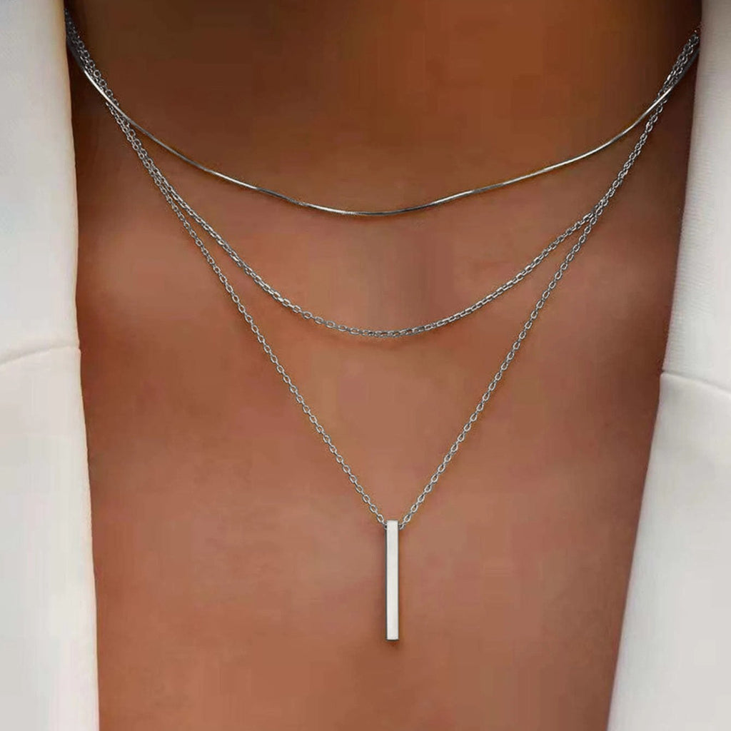 Damen mehrlagige Kette mit funkelndem Anhänger und filigranen Details Shop Nory