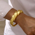Damenarmreif mit elegantem, gewundenem Design Shop Nory