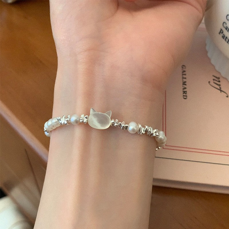 Damen Armband mit handgefertigtem Katzenanhänger und edlen Perlen Shop Nory