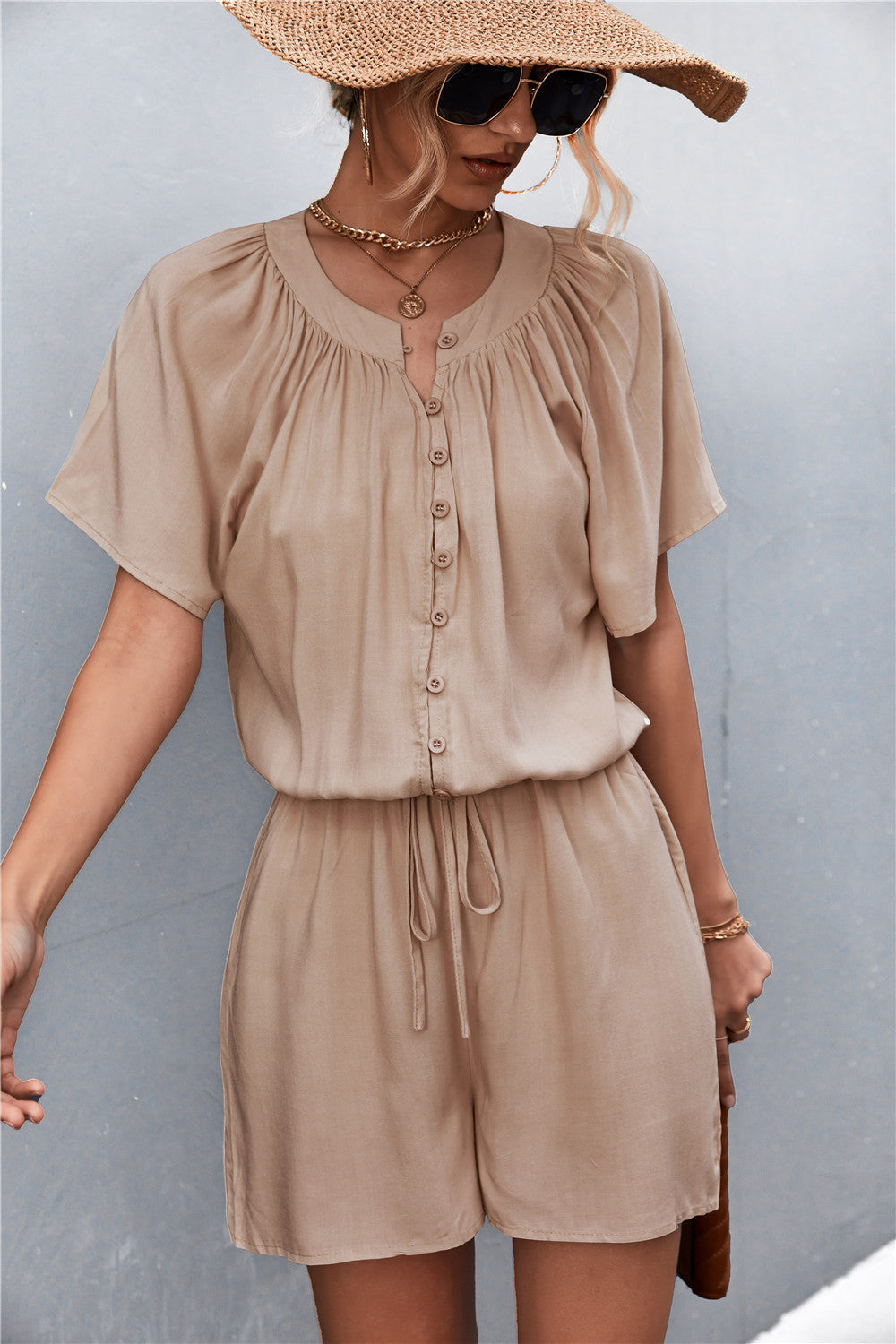 Damen Jumpsuit mit elastischem Bund und knopfverzierter Front