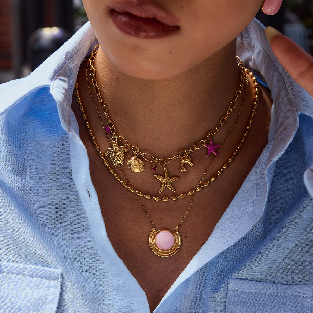 Damenohrringe mit rosa Stein und Goldrahmen Shop Nory