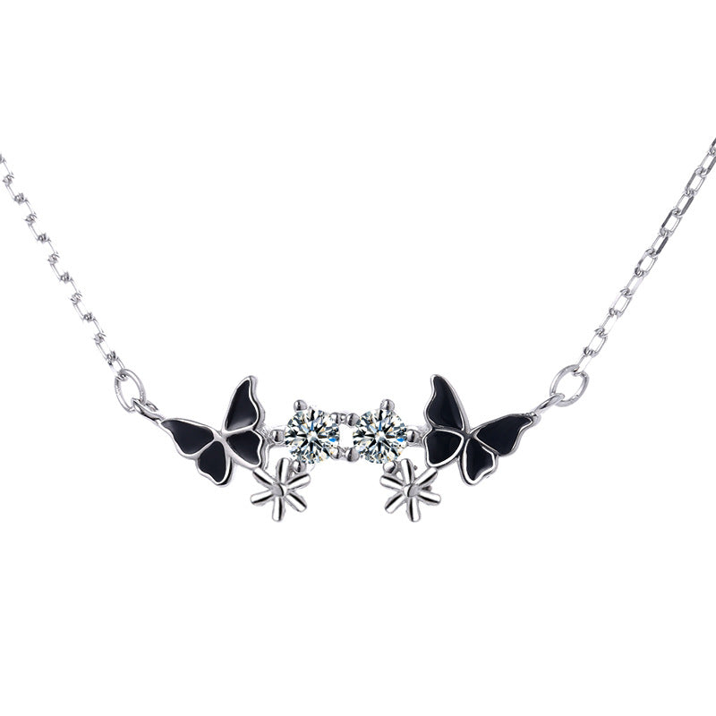 Damen Halskette mit filigranem Schmetterlings- und Blumenmotiv Shop Nory