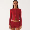 Einfarbige schmal geschnittene lange Strickjacke
