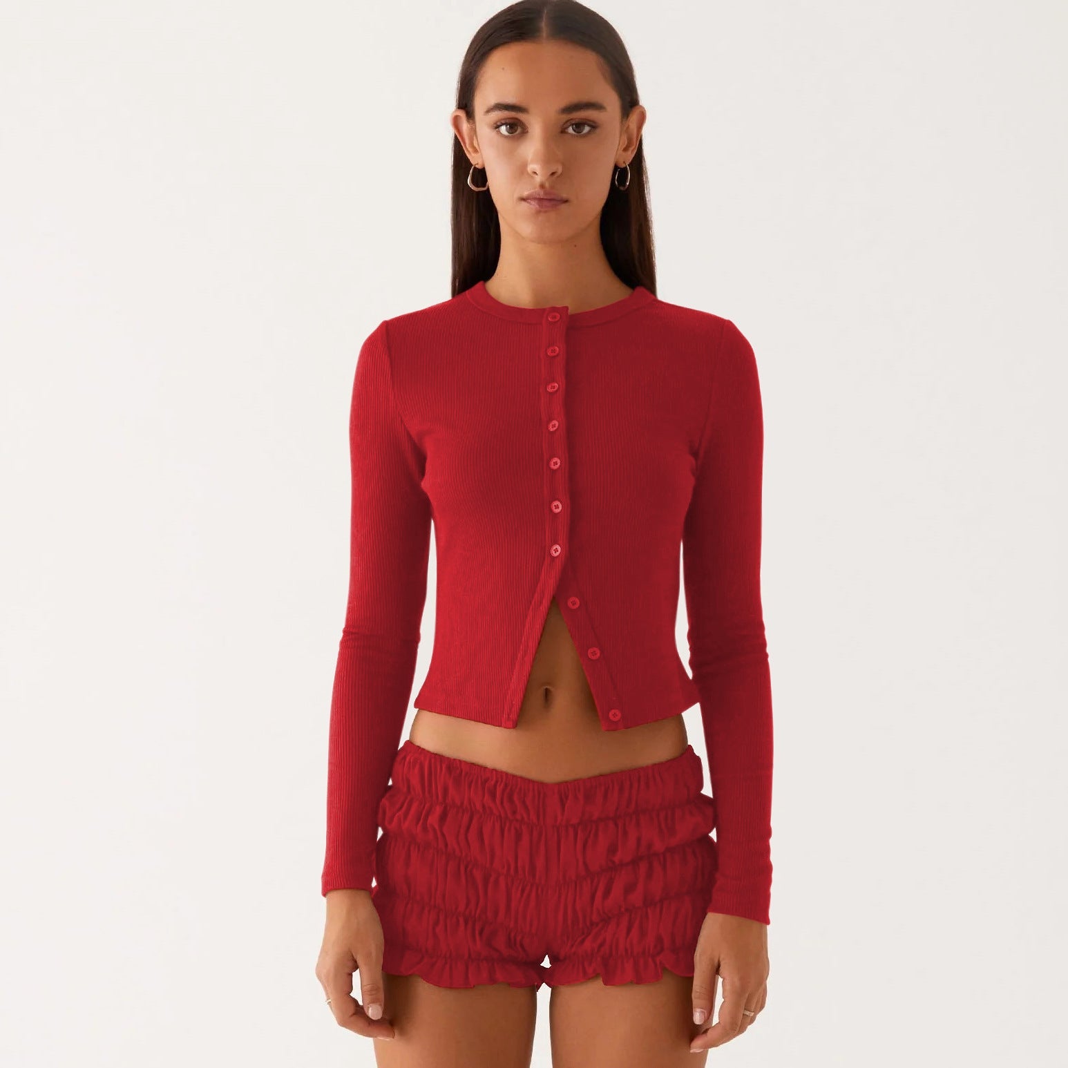 Einfarbige schmal geschnittene lange Strickjacke
