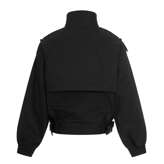 Damen Kurz geschnittene Boxy-Trenchjacke mit hohem Funnelkragen, Schulterklappen und verstellbarem Taillengurt Shop Nory