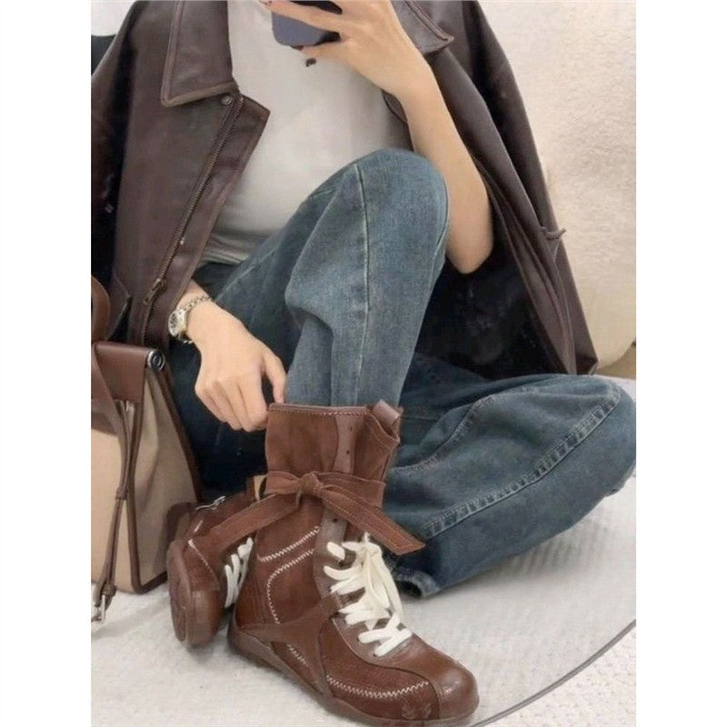 Damen Schnür-Ankleboots mit dekorativer Ziernaht, Riemenverschluss und markanter Profilsohle Shop Nory