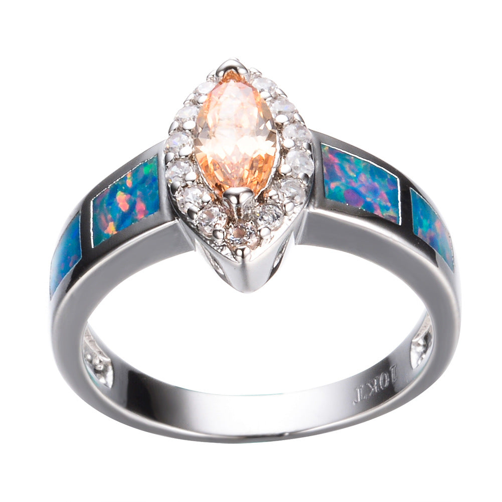 Damen Schmuckring mit funkelndem Zirkonia und schimmernden Opalmosaiken Shop Nory