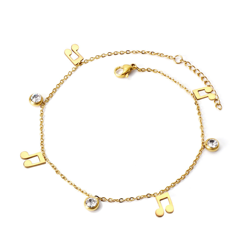 Damen Armband mit funkelnden Zirkonia und handgefertigten Anhängern Shop Nory