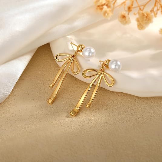 Damen Ohrringe mit eleganter Schleifenform und Perle Shop Nory