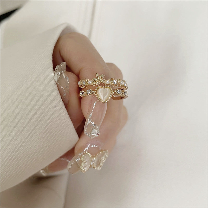 Damenring mit romantischem Herzmotiv und funkelnden Details Shop Nory