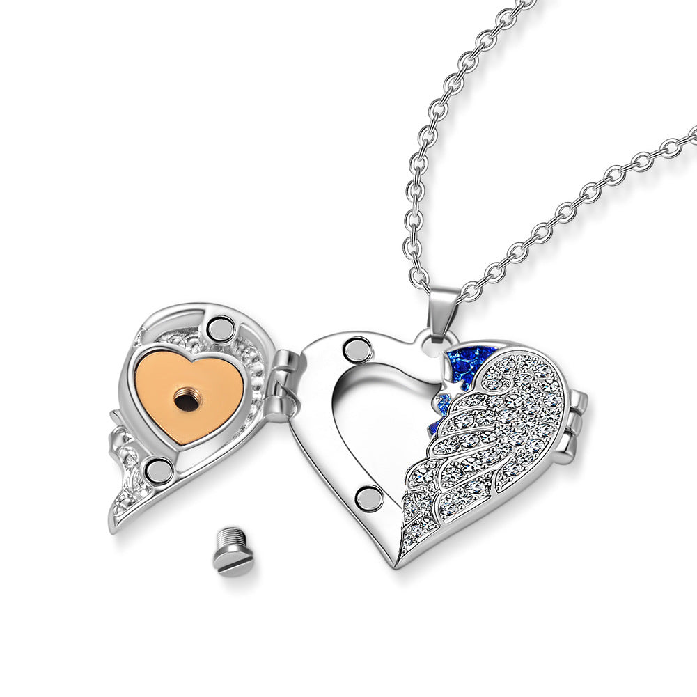 Damen Herzanhänger mit Flügel-Design und funkelnden Zirkonia Shop Nory