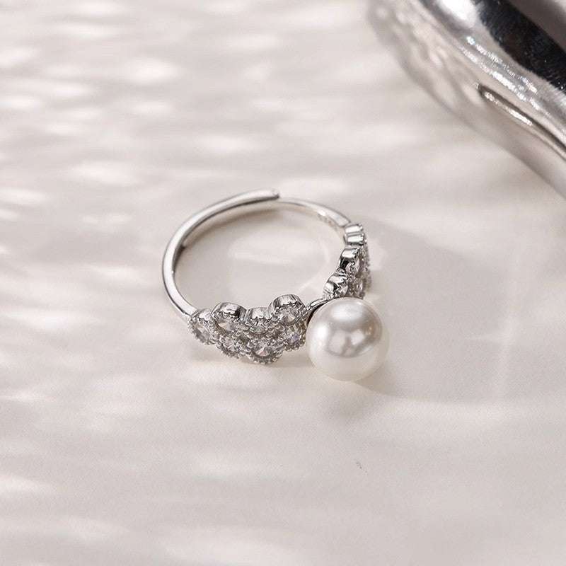Damen eleganter Ring mit funkelnden Kristallen und Perle Shop Nory