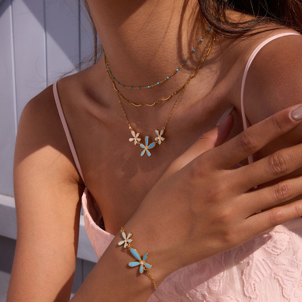 Damen Armband mit blütenförmigen Anhängern aus hypoallergenem Edelstahl Shop Nory
