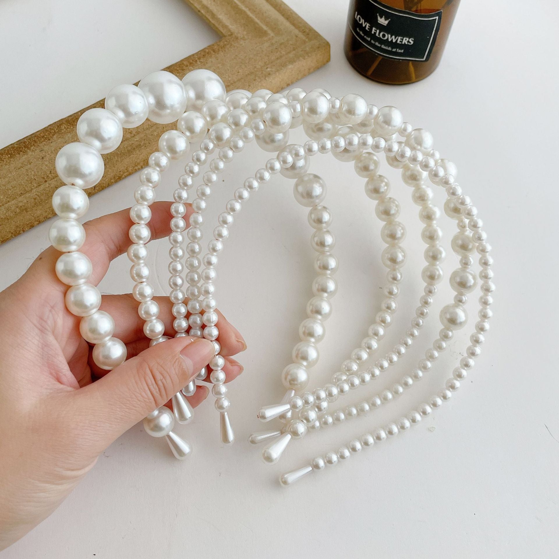 Damen Haarband mit eleganten Perlenakzenten Shop Nory