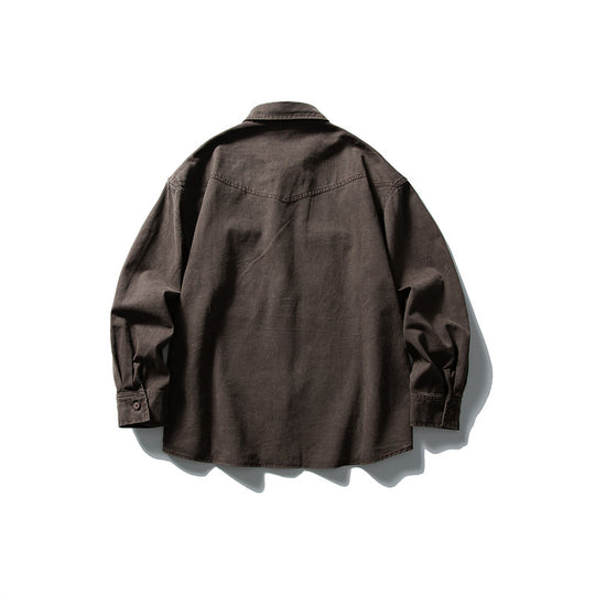 Unisex Oversize Baumwoll-Denim Hemdjacke mit aufgesetzten Brusttaschen und gerundetem Saum Shop Nory