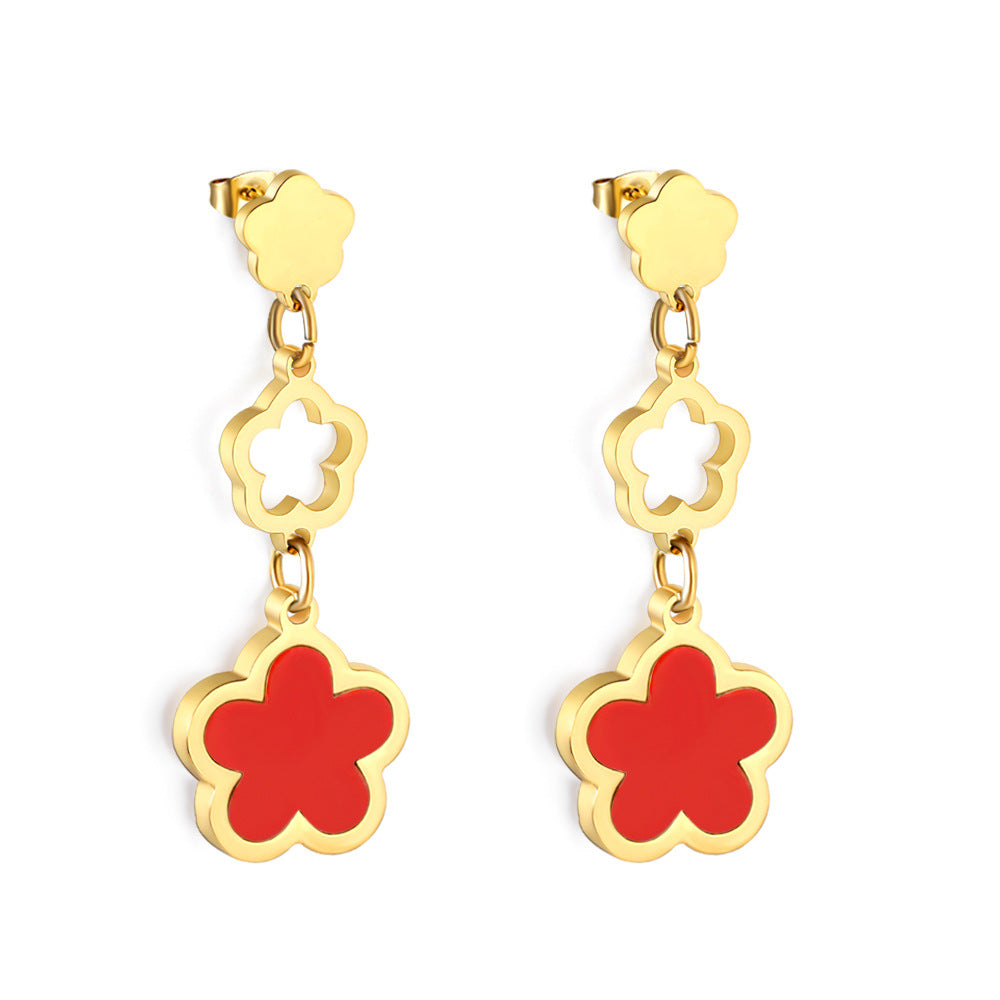 Damen Hängende Ohrringe mit floralem Design und glänzender goldfarbener Oberfläche Shop Nory