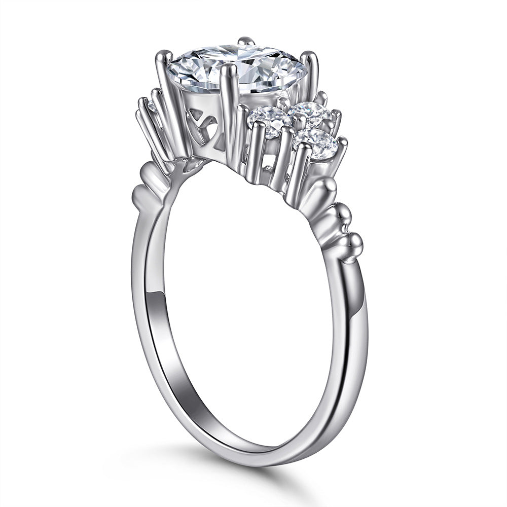 Damen Verlobungsring mit funkelndem Brillantdesign und modernem Edelstahlbesatz Shop Nory