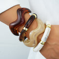 Damen modernes Armreif-Set mit eleganten geschwungenen Designs Shop Nory