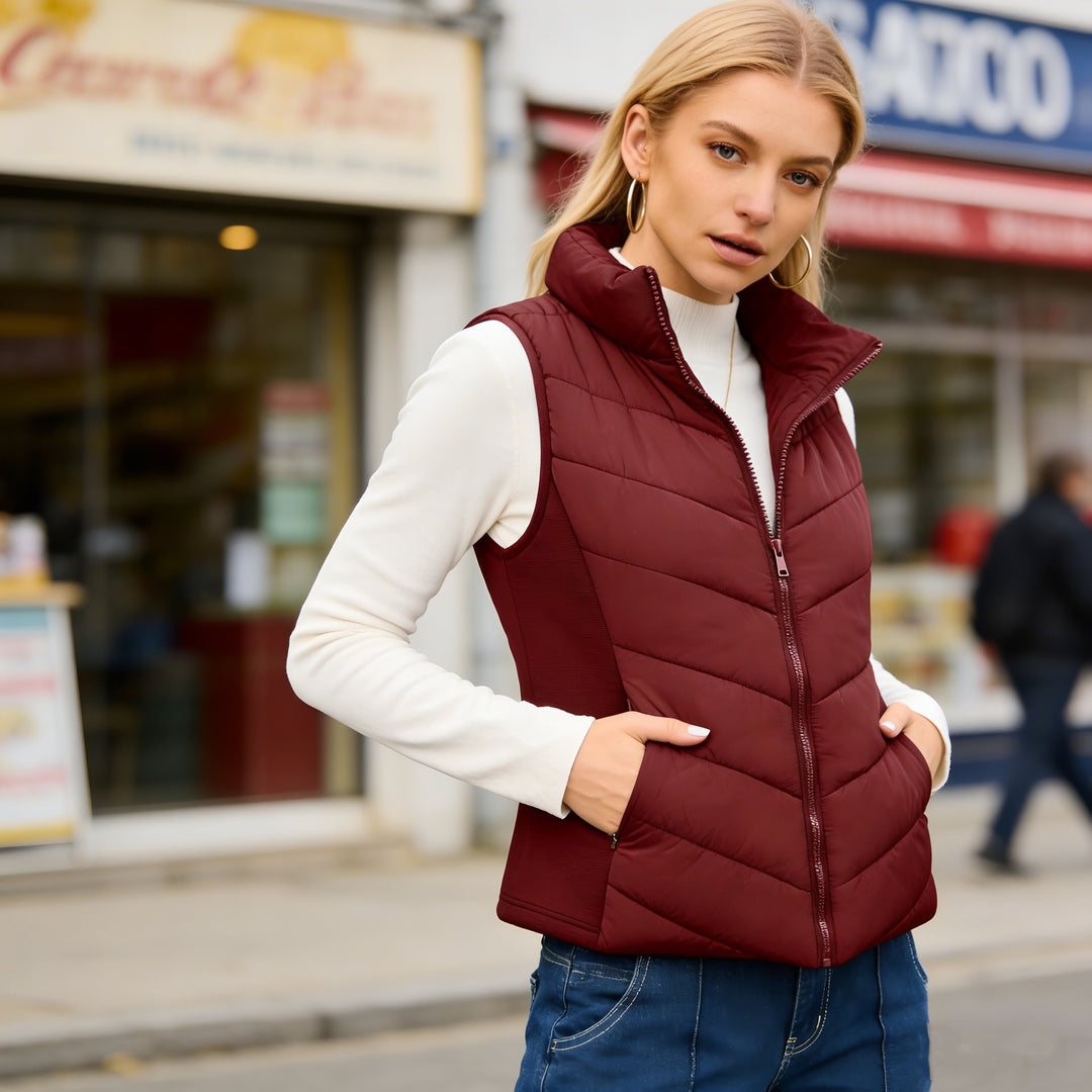 Damen Steppweste mit hohem Stehkragen und figurbetonten Stretchseiten Shop Nory