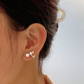 Damen Ohrstecker mit eleganter Perle und strahlenden Kristallen Shop Nory
