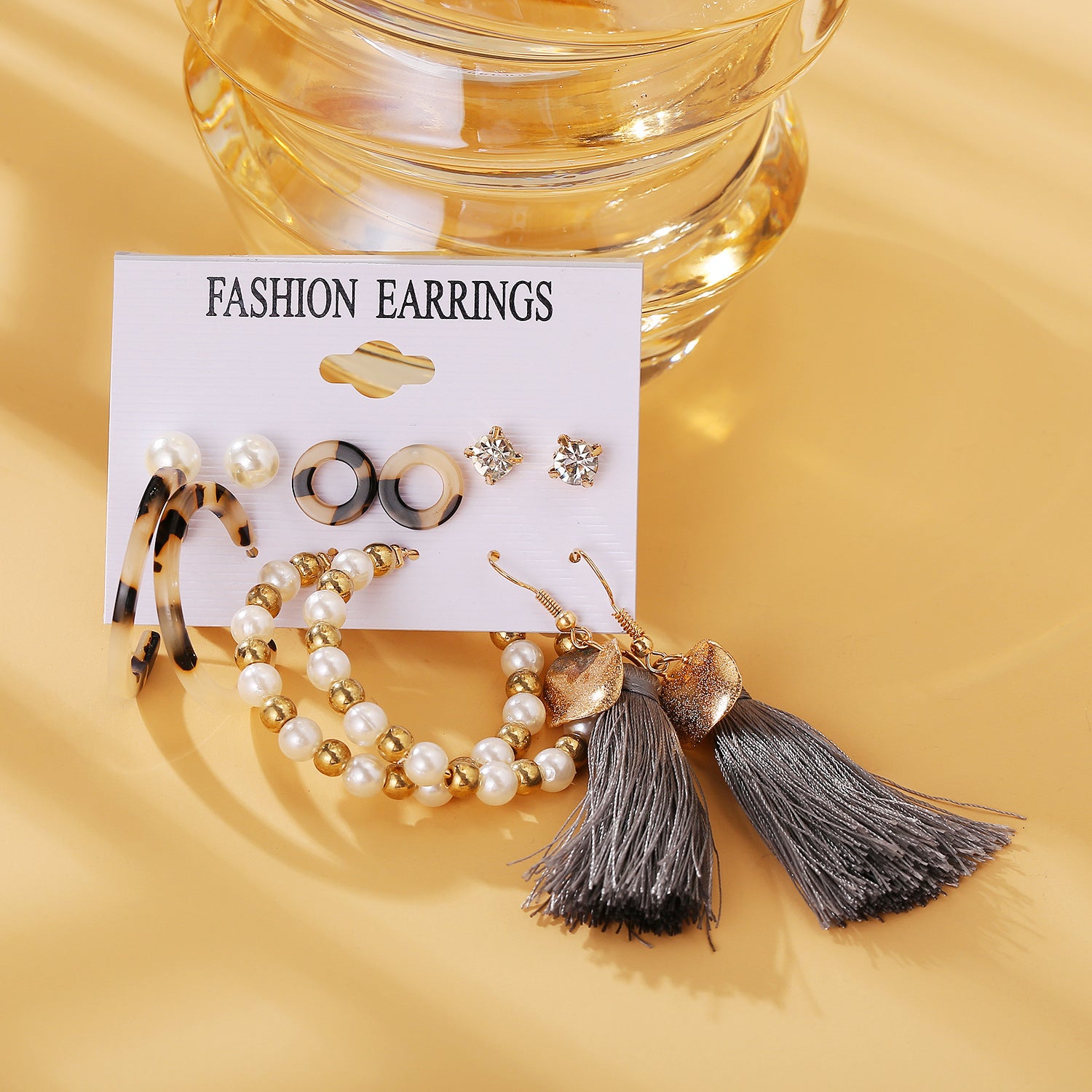 Damen Schmuckset mit verschiedenen Ohrsteckern und langen Quastenohrringen Shop Nory