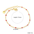 Damen zartes goldplattiertes Armband mit roten Akzenten Shop Nory