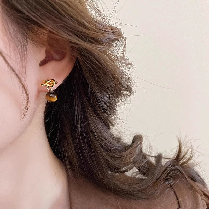 Damen Ohrringe mit einzigartigem Knoten-Design und kunstvollen Kugeln Shop Nory