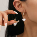Damen Ohrringe mit elegantem Schmetterlingsanhänger Shop Nory