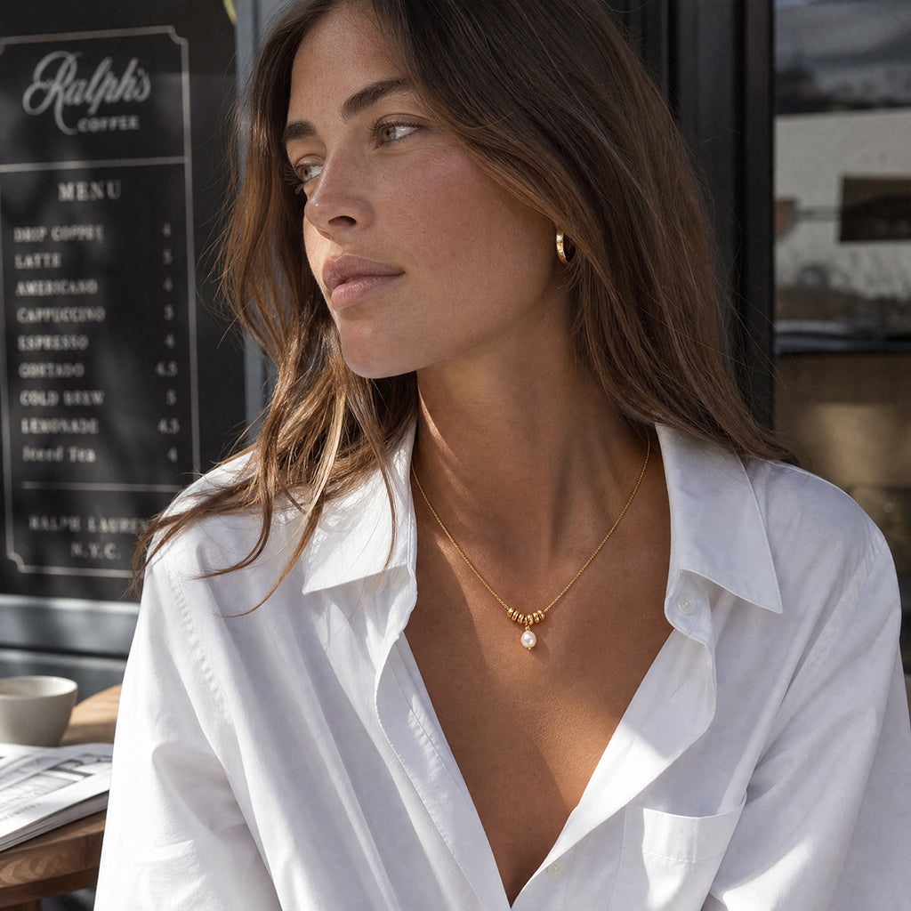 Damen Halskette mit eleganten Perlen und drehbarem Design Shop Nory
